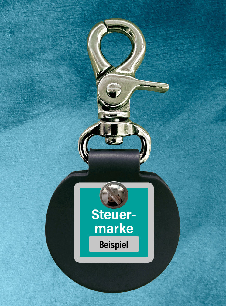 Der Humabu hält die Hundemarke und die Tasso-Plakette geräuschlos zusammen.