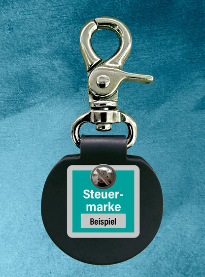 Der Humabu hält die Hundemarke und die Tasso-Plakette geräuschlos zusammen.